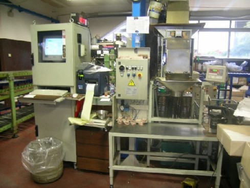 Impianto di dosaggio e confezionamento minuterie in sacchi, PC collegato a Gestionale